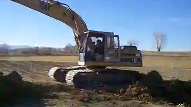 Tyler working the excavator on Uncle Troy's farm смотреть онлайн