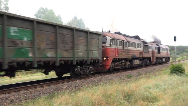 Тепловоз 2М62К-0486 с грузовым поездом / Diesel locomotive 2M62K-0486 with a mixed freight train смотреть онлайн