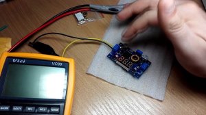 Понижающий преобразователь XL4015. Тоже сдох от КЗ.