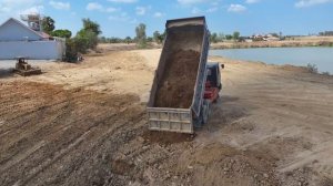 Строительство, засыпка старого озера под застройку