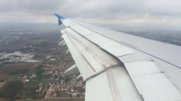 Airbus A321 EI-ETL of MetroJet Aircompany landing at Rimini airport at runway 31