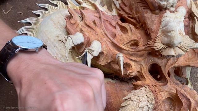 Carved Woodart Into Dragon And Phoenix Statues