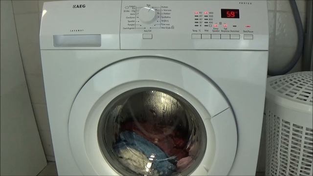 AEG Lavamat Protex L72475FL Time save extra rinse 95 °C program washing machine, example movie. 271 смотреть онлайн
