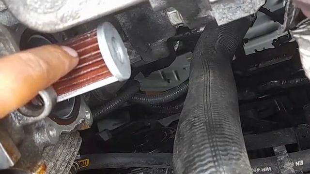 Ubicacion del filtro escondido de Transmision CVT nissan Rogue 2016. смотреть онлайн