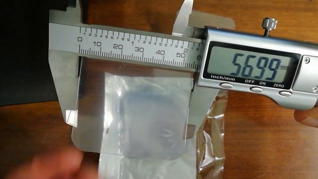 Посылка с алиэкспресс. Продавец пишет, что размер 60х60 и толщина 0.78 смотреть онлайн