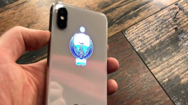 iPhone X со светящимся гербом Республики Узбекистан смотреть онлайн