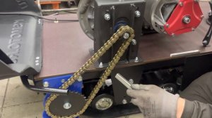 В какую сторону установить собачку замка цепи мотобуксировщика