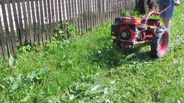 Мотоблок МТЗ 08-МТ. С сегментной навесной косилкой КН-1. смотреть онлайн