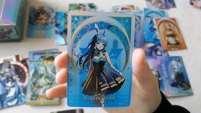 Распаковка коллекционных карточек по Genshin Impact. смотреть онлайн
