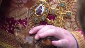Чин омовения мощей –  ``Освящение воды мощами``..