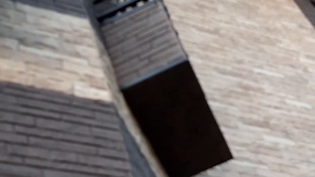 Облицовка фасада каркасного дома фиброцементными панелями NICHIHA под камень