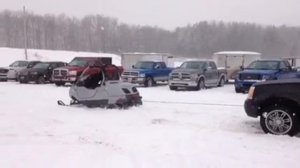 Ski-Doo Elite tows Duramax Escalade and Trailer