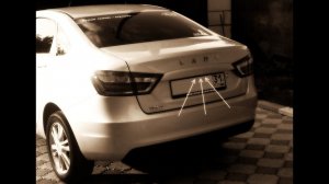 Lada Vesta 1G. Сенсорная кнопка открывания багажника
