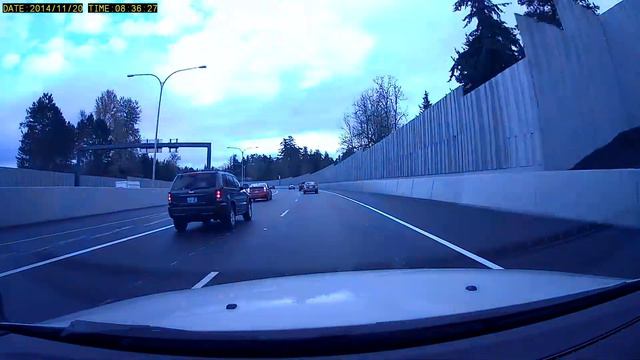 Prius drives in between lanes on corner смотреть онлайн