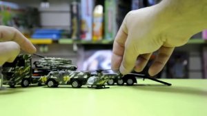 ТехноПарк 1:43 Грузовой автомобиль с военной техникой 132078