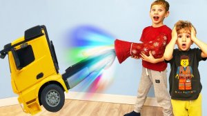 Lev and Gleb take Power wheels Trucks from Santa's boots Ride on and play with them #2