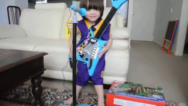 Sam with playing his electric guitar. смотреть онлайн