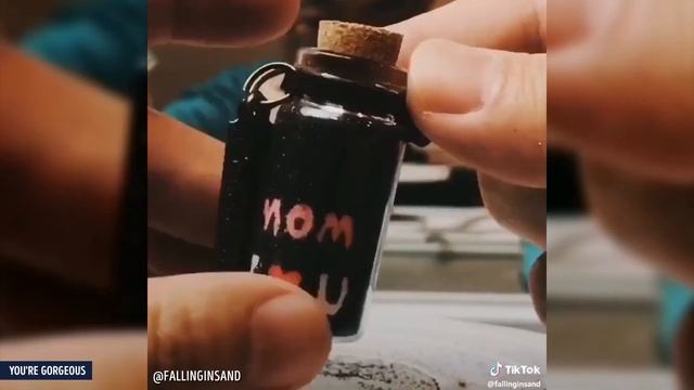 PAINTING WITH COLORED SAND IN A GLASS BOTTLE