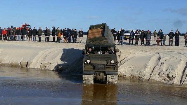 Volvo BV202 Amphibious Vehicle Offroading In A Creek