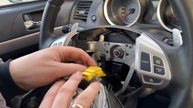 Как снять руль Митсубиси Лансер 10 Mitsubishi Lancer X подробная инструкция . смотреть онлайн
