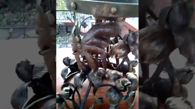 Третий этап покраски кованой подставки для цветов