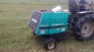 Пресс-подборщик takakita rb-510  в работе