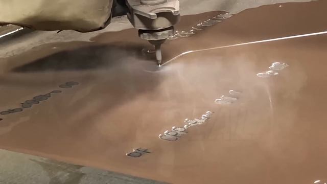 Water Jet Cutting Through 3