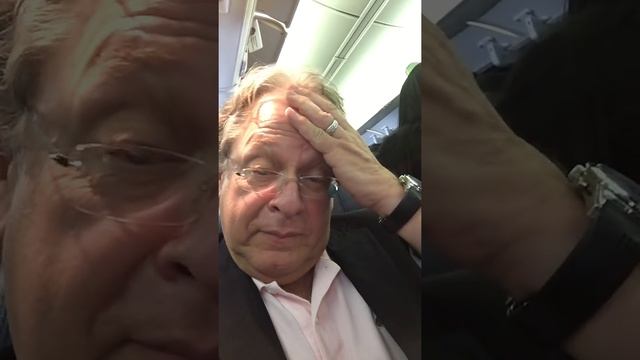 Listen as passenger screams in the face of screaming kid... смотреть онлайн