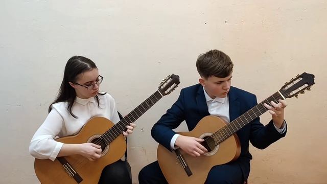 Дуэт гитаристов: Бугаева Ксения, Серенков Егор. В. Ерзунов "У камина". смотреть онлайн