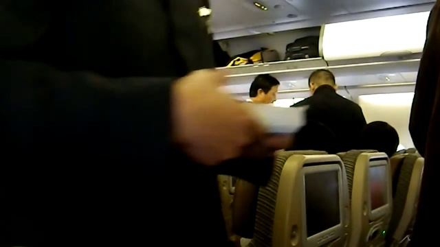 an Excited Chinese Man in The Plane at Tianjin Airport 24 04 2012 смотреть онлайн