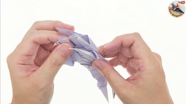 Transforming A AUTOBOT COG Origami Transformer