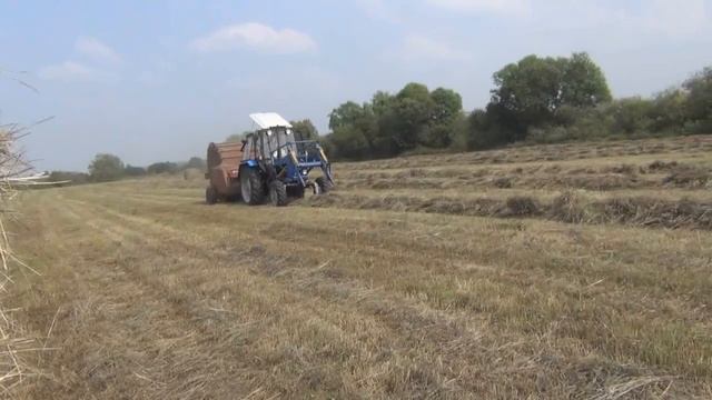 СЕНОКОС 2019/МТЗ-82 VS т-40 собираем в валки и прессуем сено смотреть онлайн