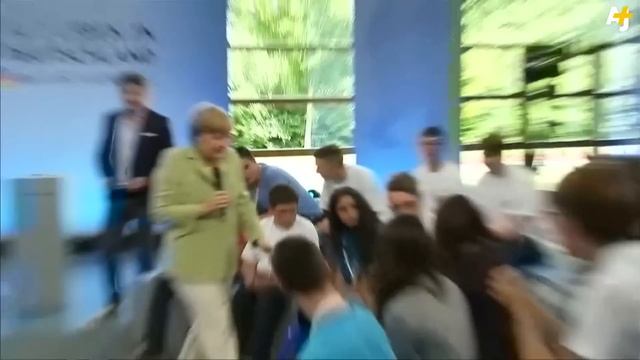 German Chancellor Angela Merkel Makes Refugee Girl Cry