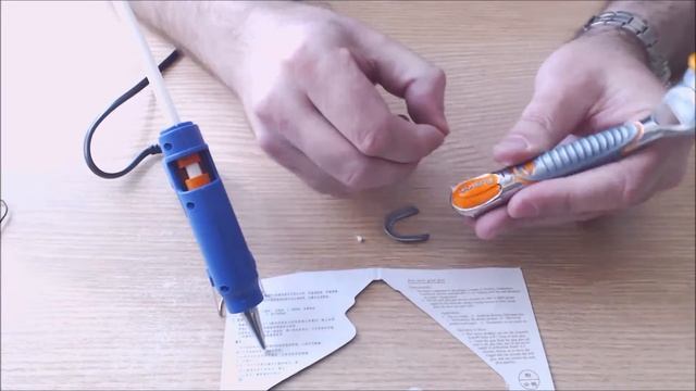 Клеевой термопистолет SD-E 20W из "AliExpress", можно клеить ламинат. смотреть онлайн