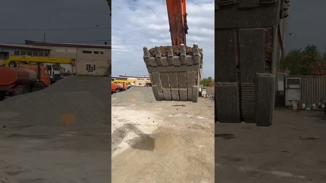 Погрузка экскаватором из конуса.