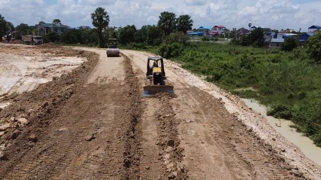 Update Processing Project By Bulldozer CAT Pushing the Land buried in the ditch with 25 Dump Truck смотреть онлайн