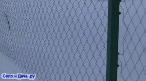 Наш поврежденный снегом забор из сетки рабицы. Как не совершить ошибки в строительстве?
