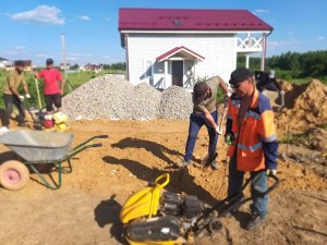 Отсыпка и поднятие участка под стоянку на даче