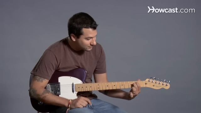 How to Play an E Minor Open Chord | Guitar Lessons смотреть онлайн