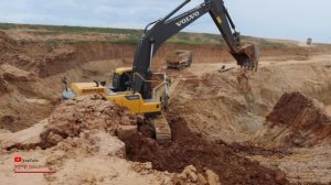Extreme Excavator Operator Moving Loading Soils On Dump Truck Working Volvo EC250DL
