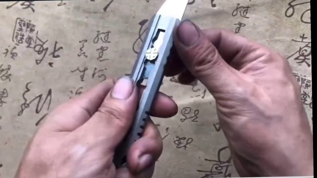 фронтальный нож с титановой рукоятью