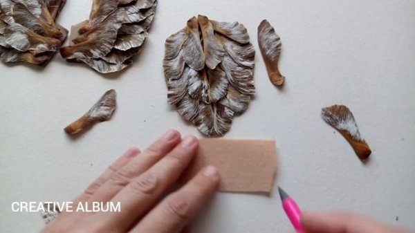 Craft from natural material "Owl". Autumn crafts.