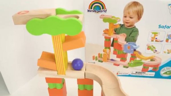 Genevieve plays with this Fun Wooden Marble Maze for Kids!