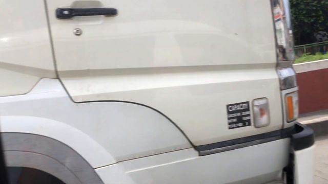 White Mitsubishi Fuso Super Great Flatbed Truck in Congressional Ave. смотреть онлайн
