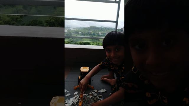 Siddhant playing with Bruder Backhoe Loader смотреть онлайн