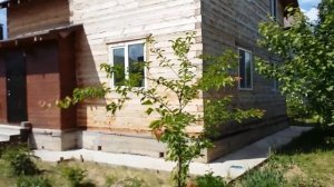 Обзор дома(Отделка стен фасада деревянного дома из бруса фасадными панелями ОДИНЦОВО)