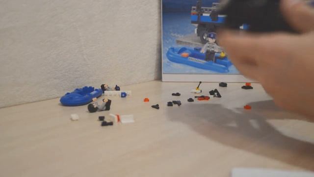 ПОЛИЦЕЙСКОЕ АВТО С КАТЕРОМ Распаковка и сборка sluban politievrachtwagen B0186 аналог lego смотреть онлайн