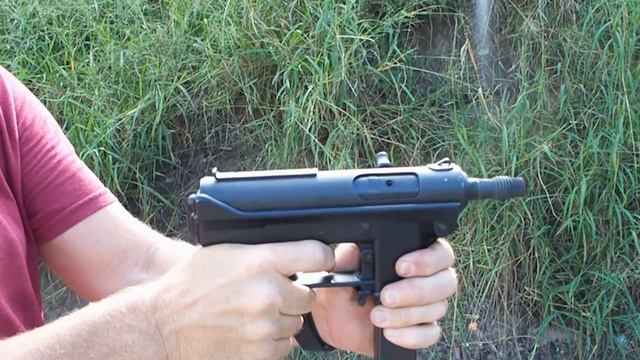 TEC-9 With A Silencer. Yes, It's A TEC-9, Just Like It Says On The Gun.
