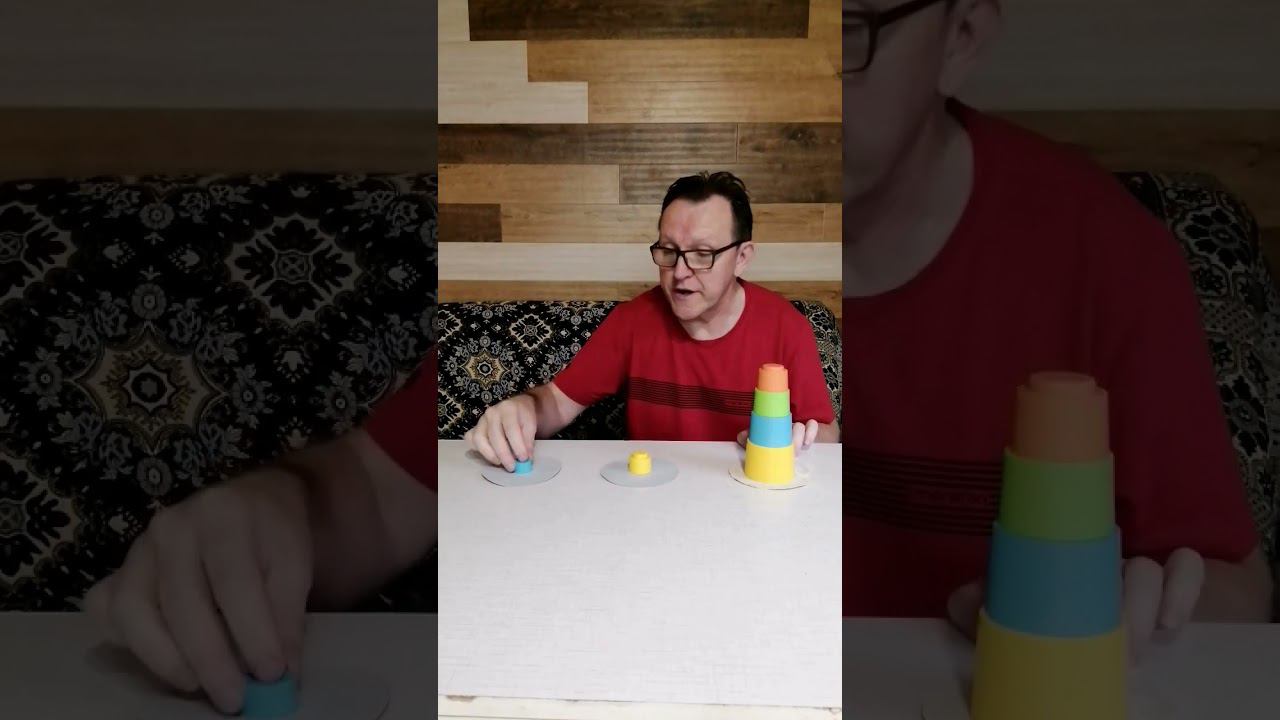 Головоломка из детской игрушки. Ханойская башня.