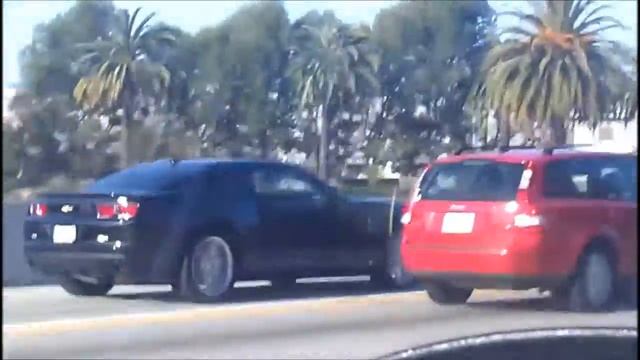 Chevy Camaro Black Speeding On The 91 Freeway